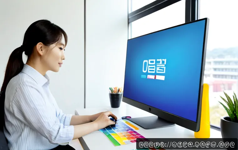 컴퓨터그래픽스운용기능사 자격증으로 할 수 있는 업무 - Photorealistic graphic design professional working at a clean modern desk, using a large monitor dis...
